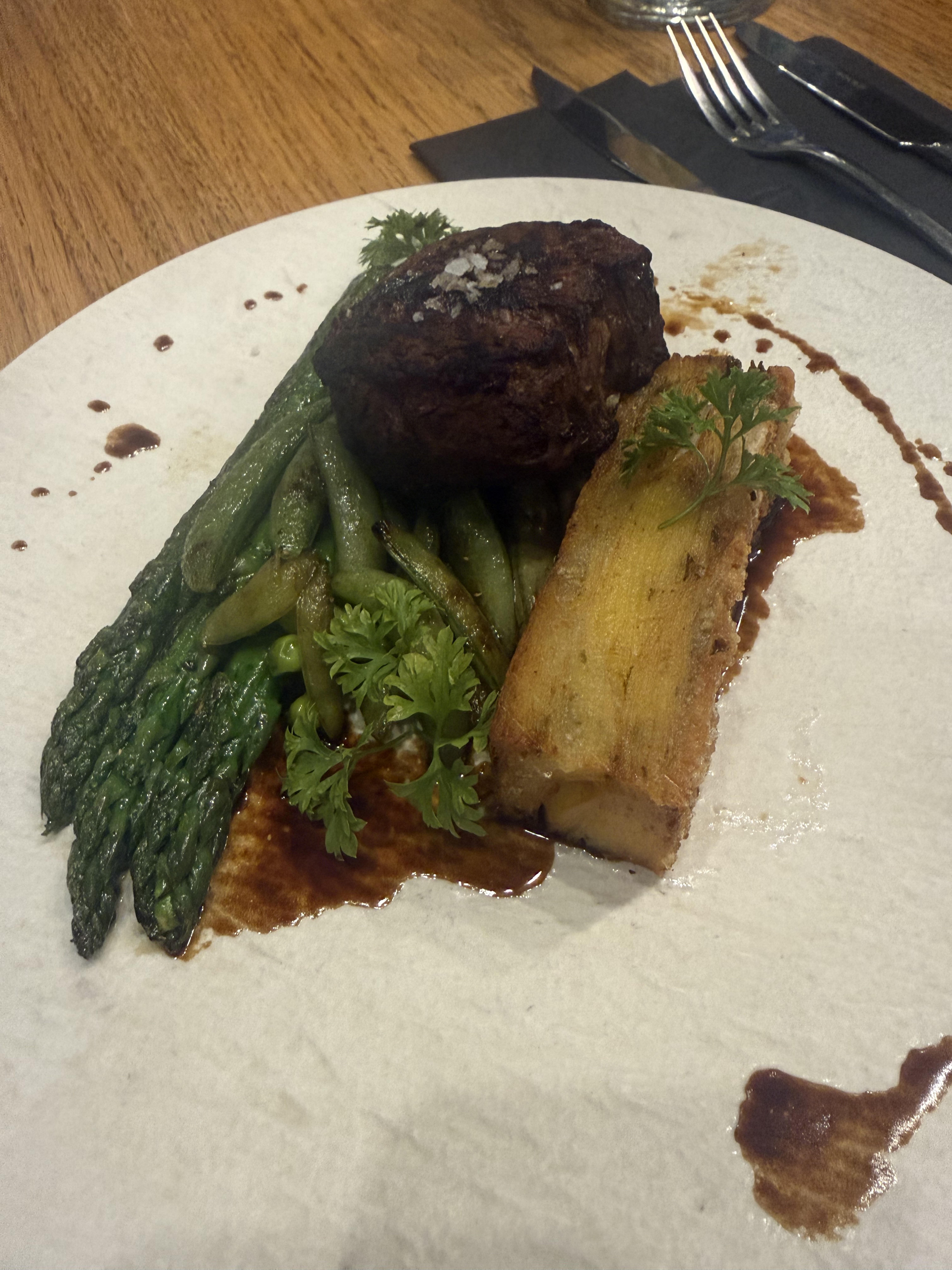 Later meal on 2026-07-20: beef with a roasted potato portion, asparagus, green vegetables, and dark sauce